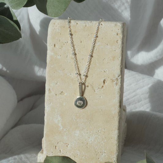 Colgante de flor de nacimiento