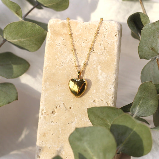 Medallón de corazón relleno de oro